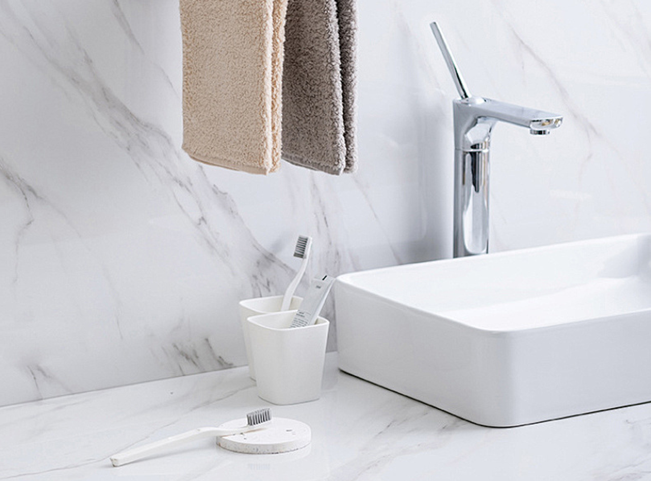 Hotel toothbrush holder